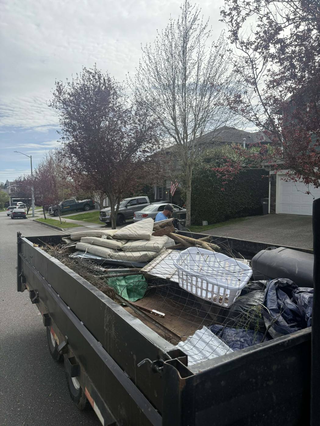 Trailer loaded with yard debris for haul-away