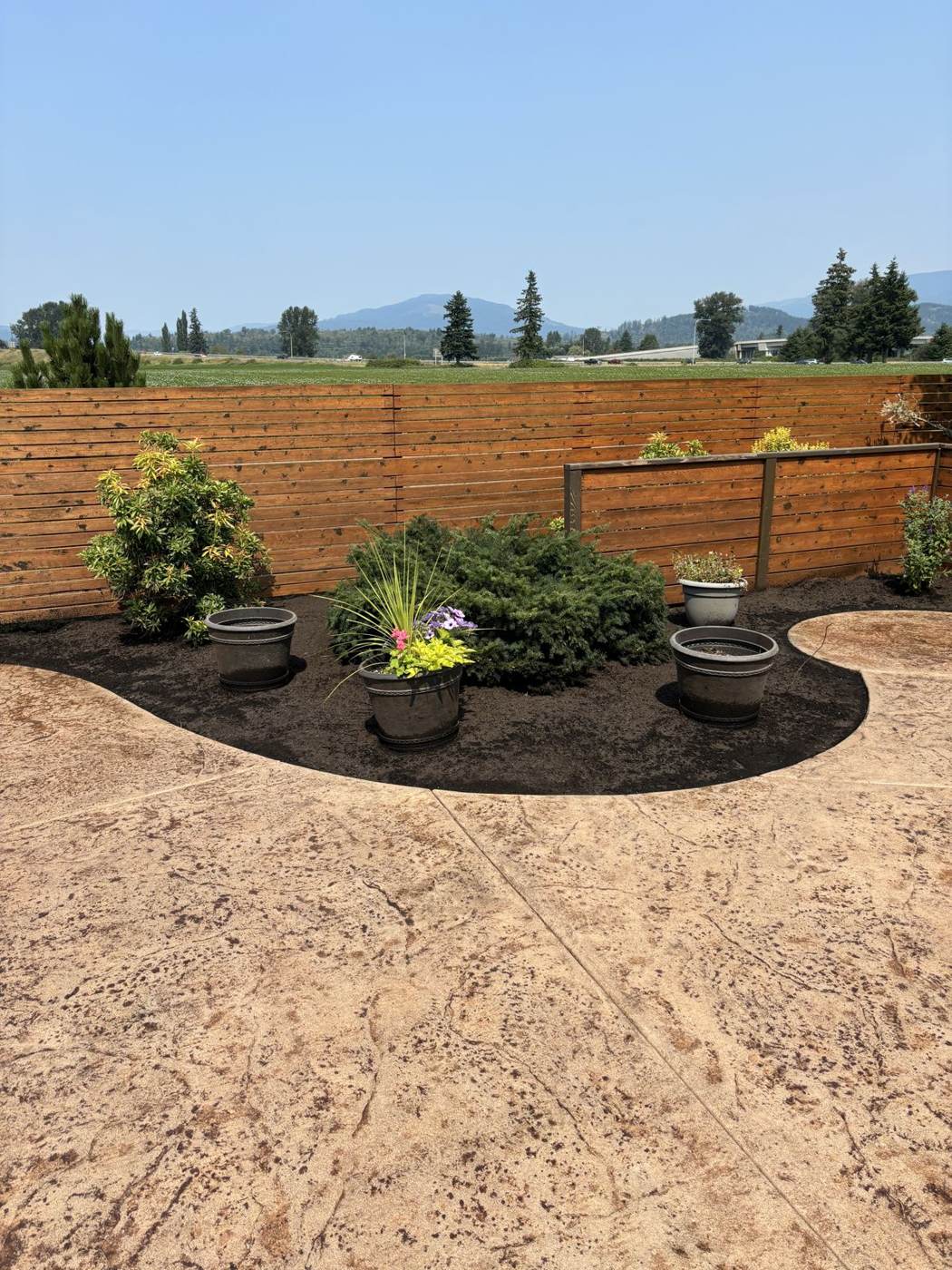 Rock border installation in progress