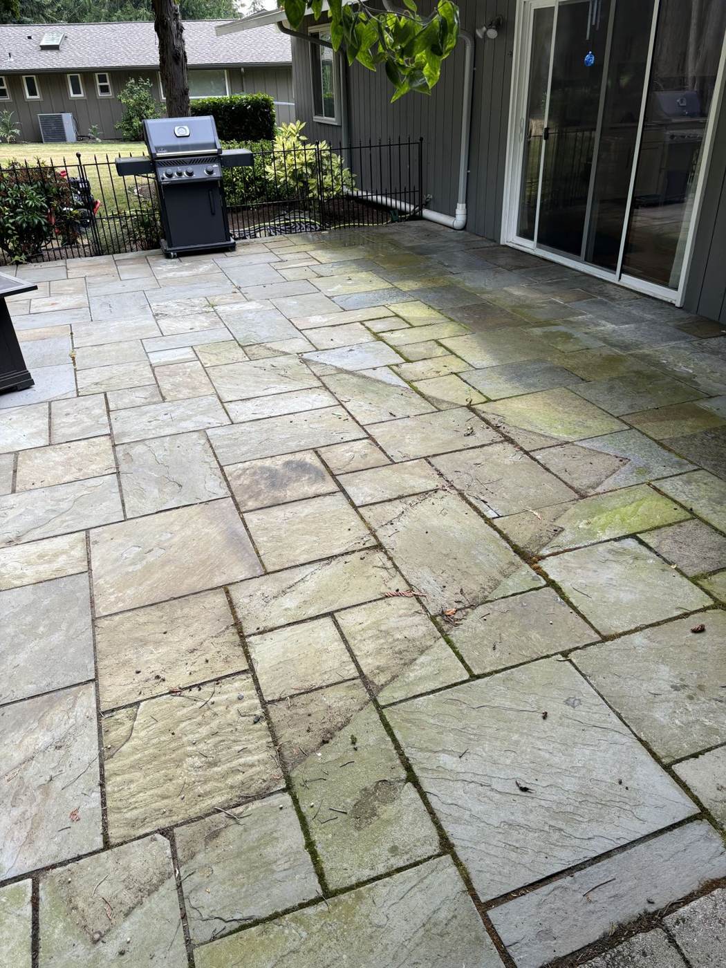 Clean stone patio after power washing