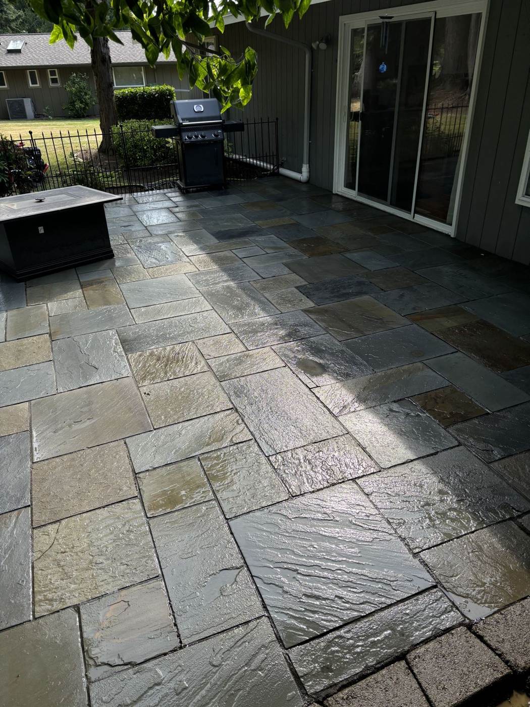 Power washing a metal roof